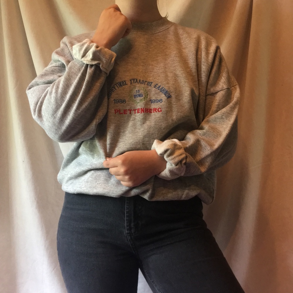 Grey crewneck sweatshirt